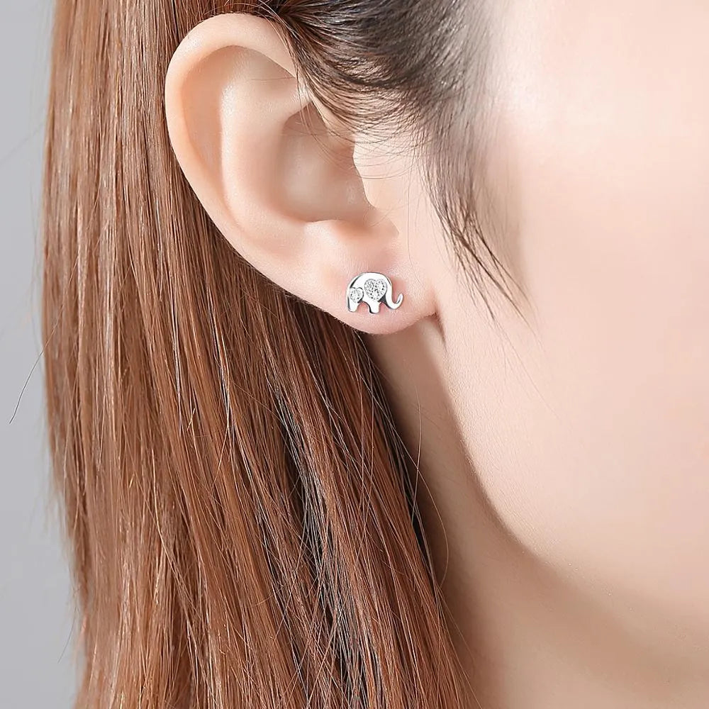 Geometric Korean silver earrings with gem setting detail in gold and silvery colours