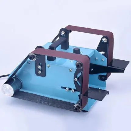 Blue desktop dual-axis belt sander with 750W motor and variable speed control for sharpening and polishing