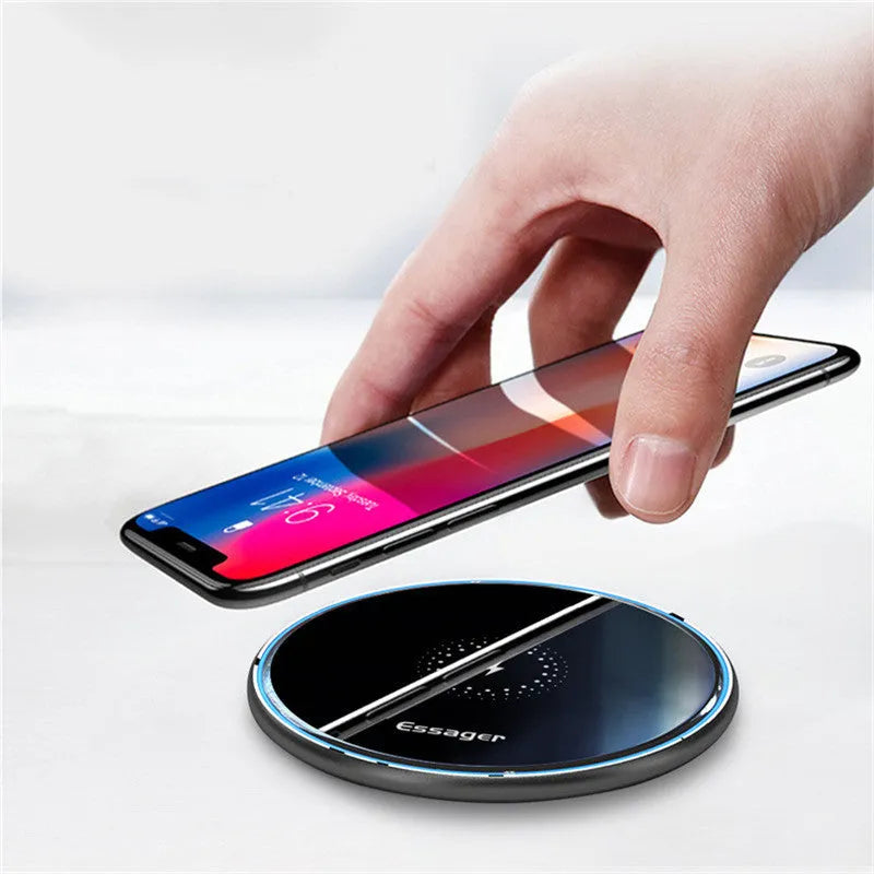 Black or white 15W Qi fast wireless charging pad with LED indicator light on anti-slip aluminium base.