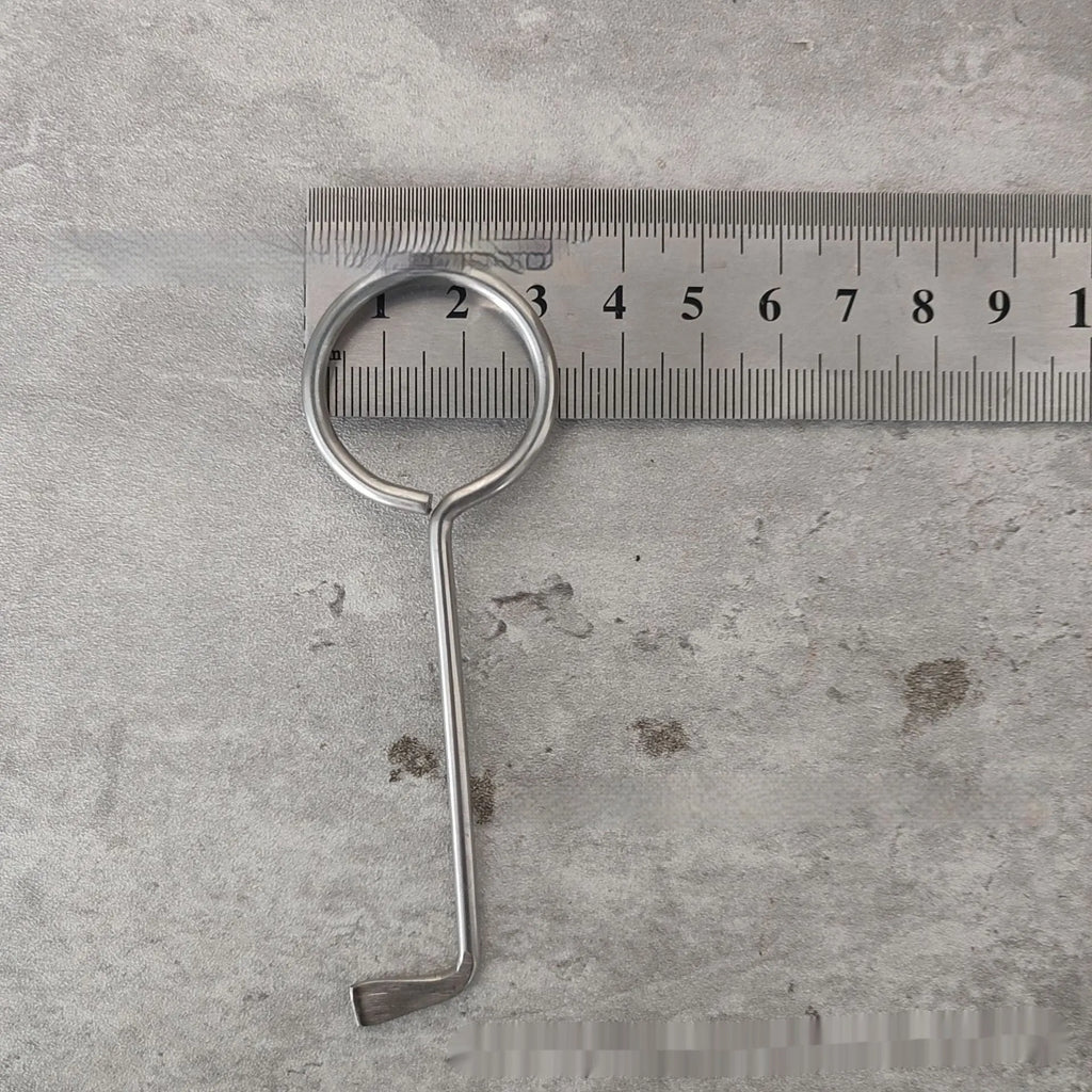 Two alloy wrench tools from a portable household tool set on a plain background.