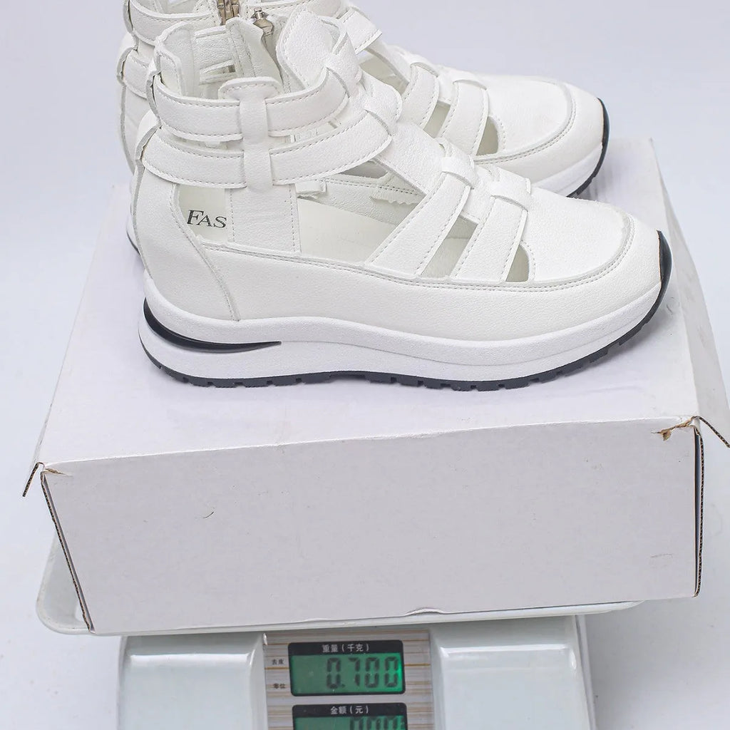 Women's black close-toed hollow-out platform sandals with Velcro strap and rubber sole