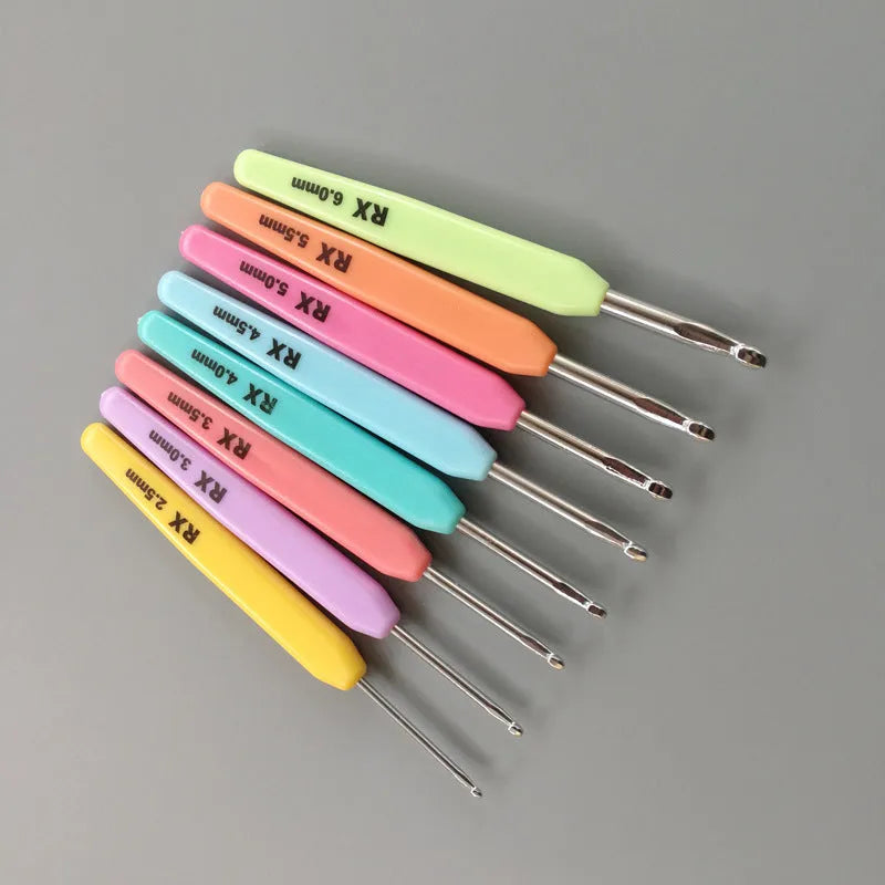 Complete set of 16 crochet hooks with soft and hard handles in a grey PU zippered bag.