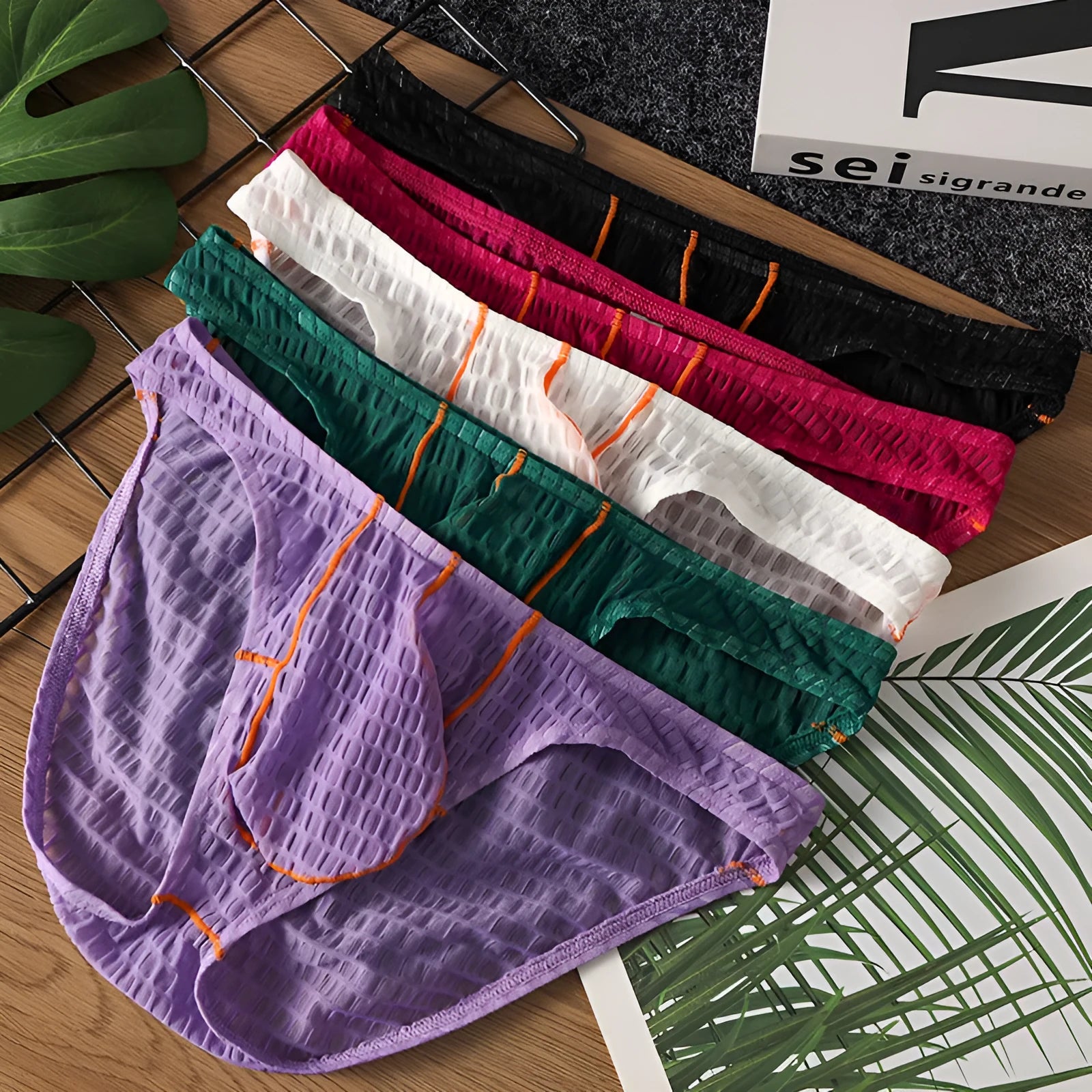 Men's low waist lace briefs in white, black, green, rose red, and light purple colours
