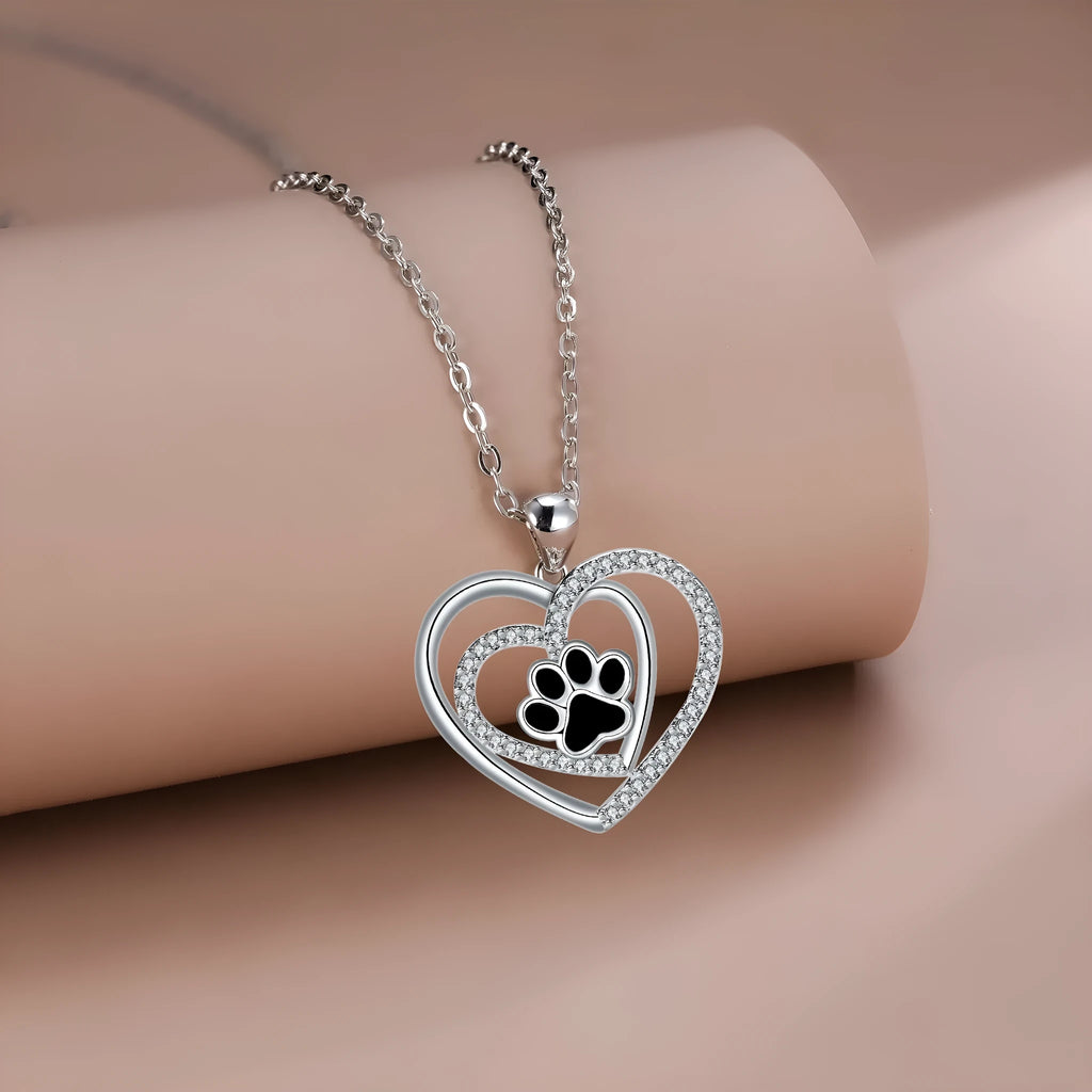 Women's copper dog paw heart pendant necklace on cross chain, electroplated finish.