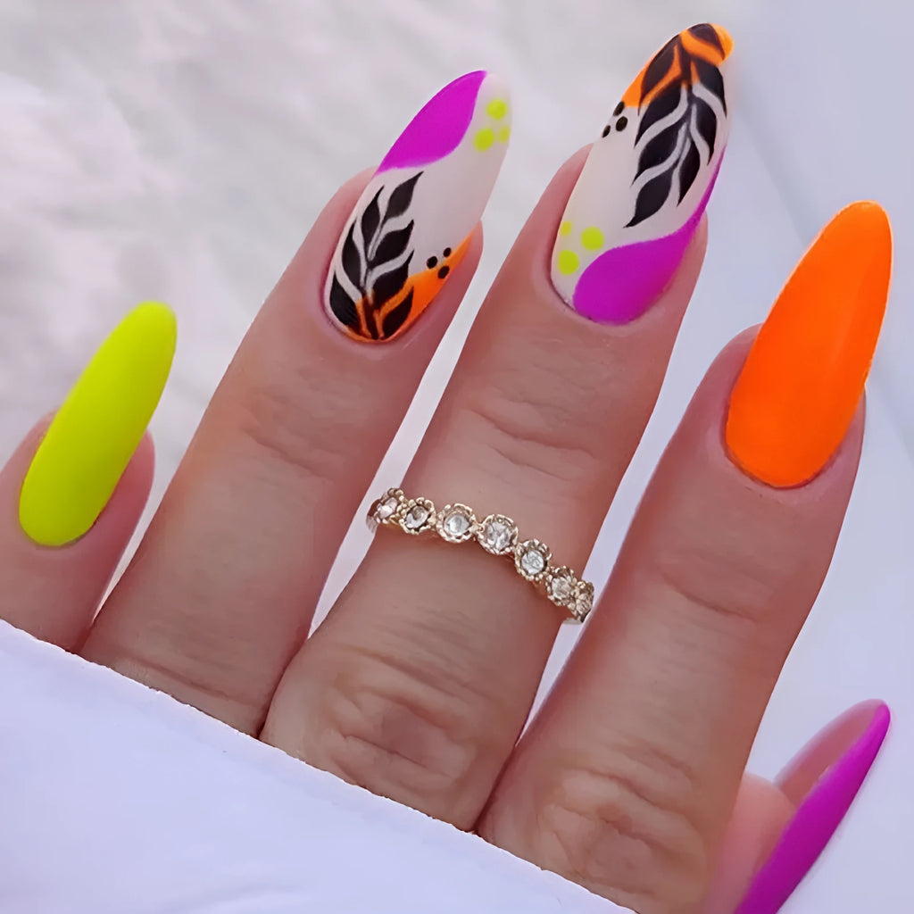 Wear Armour medium almond frosted nail stickers showing four different pattern designs.