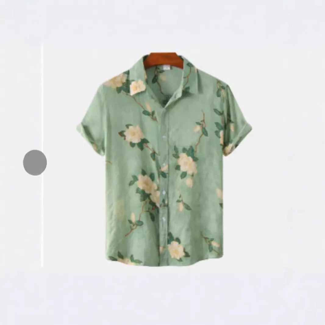 Man wearing a short sleeve Hawaiian shirt with a colourful floral print pattern.
