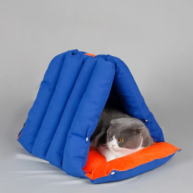 Blue triangular cat bed with drilled connection holes and removable cotton cover