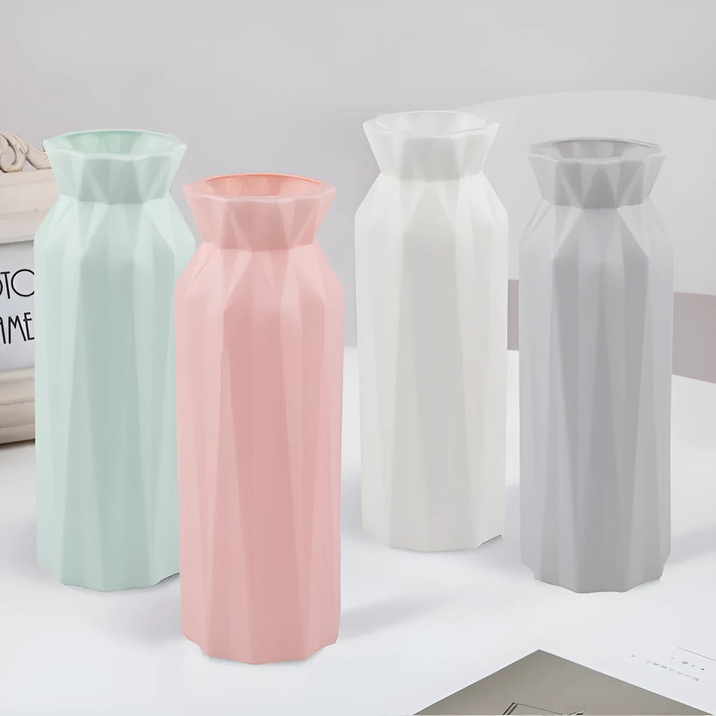 Green melamine plastic vase with 7.2cm base on a wooden table.