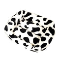 Four Seasons Universal Kennel dog bed in cow colour cloth, size M 40x50cm, with a dog resting on it.