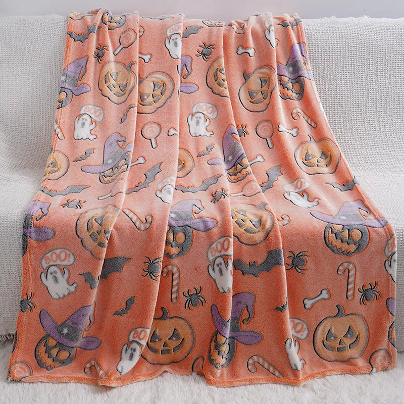 Cartoon-pattern flannel blanket laid flat, showing one of five colour options, suitable as a child's blanket or AC cover.