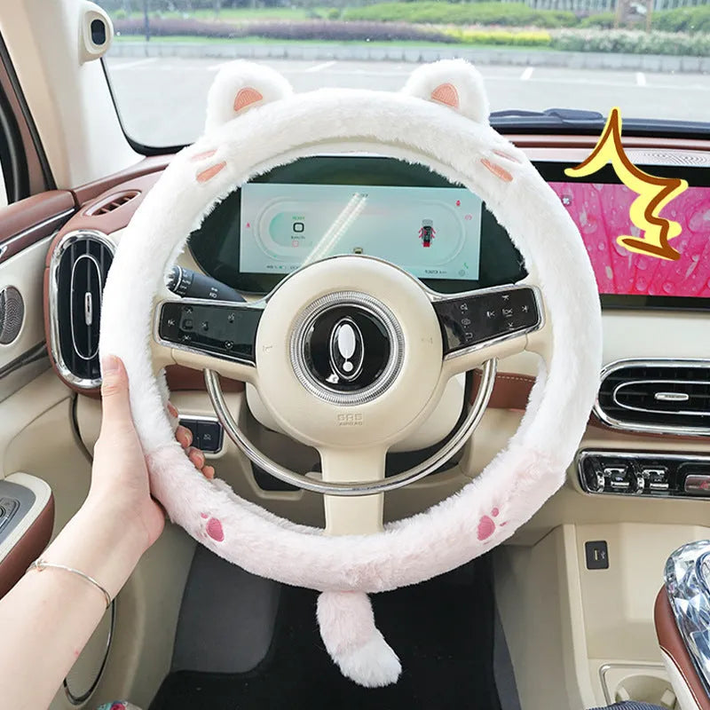 Plush steering wheel cover with embroidered animal design measuring 38cm in diameter