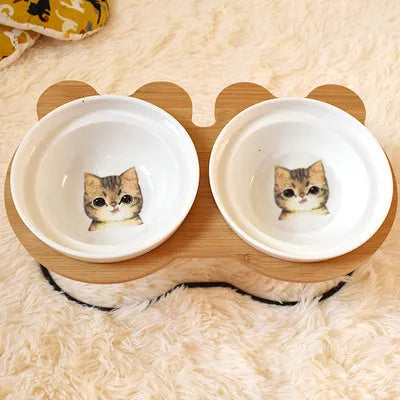 Ceramic cat bowl holder with raised rack in grey cat colour