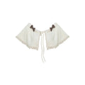 Apricot knitted top brown hip skirt and apricot shawl womens three-piece set on model