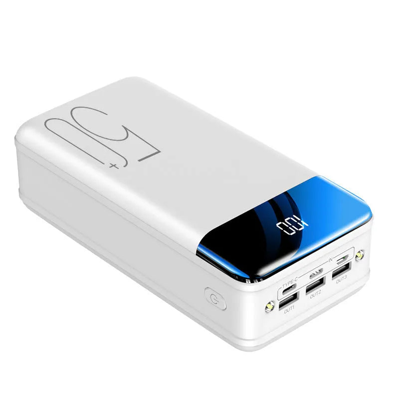 Black and white 50000mAh power bank showing three output USB ports and three input charging ports