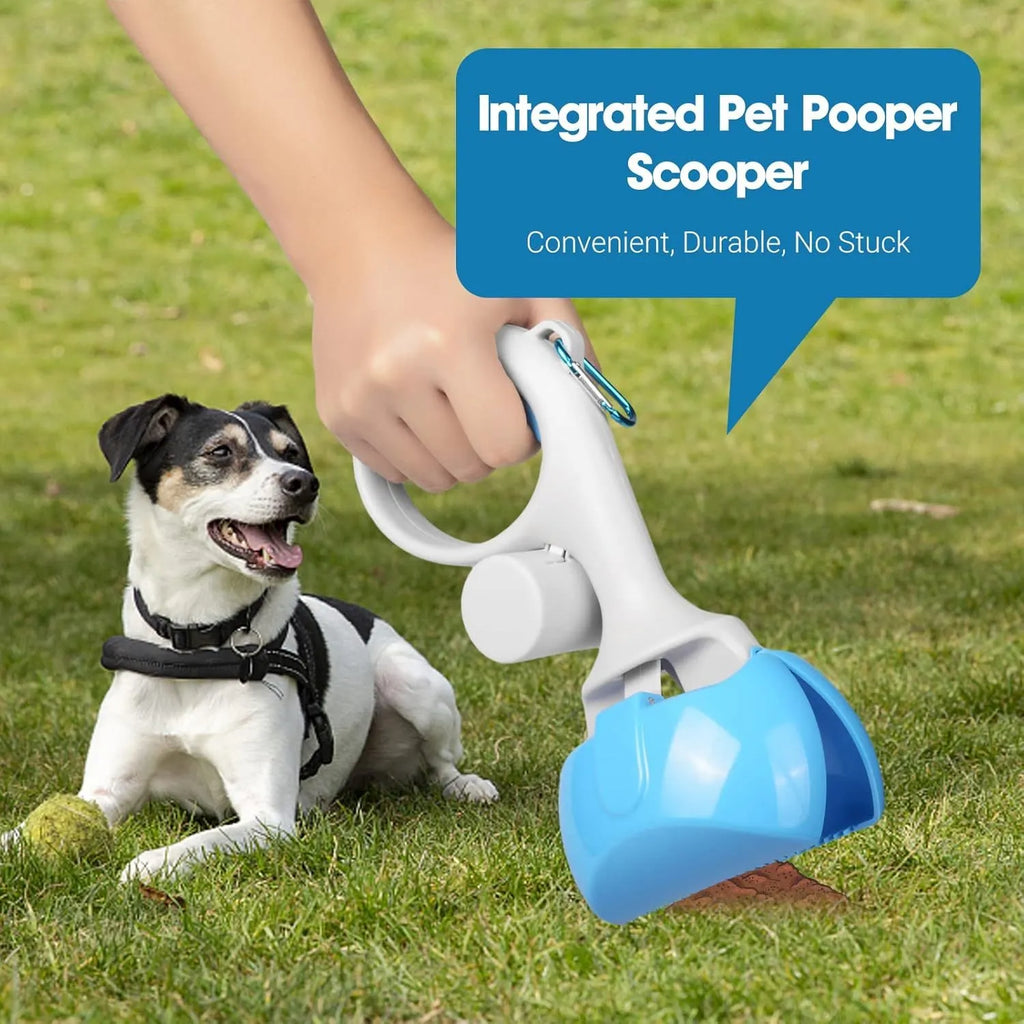 Blue pet pooper scooper with built-in trash bag holder and a hanging hook on a green lawn
