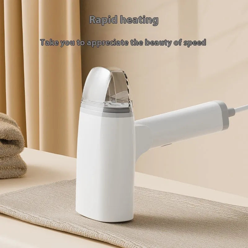 Blue and white handheld garment steamer with steam iron function, showing compact size and water tank