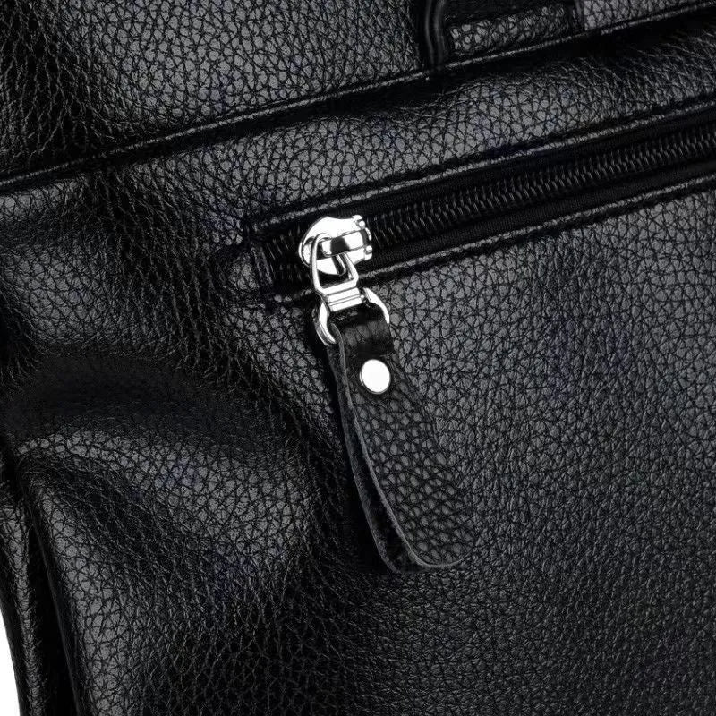 Men's black PU leather business messenger bag with splicing details measuring 35x30x4cm