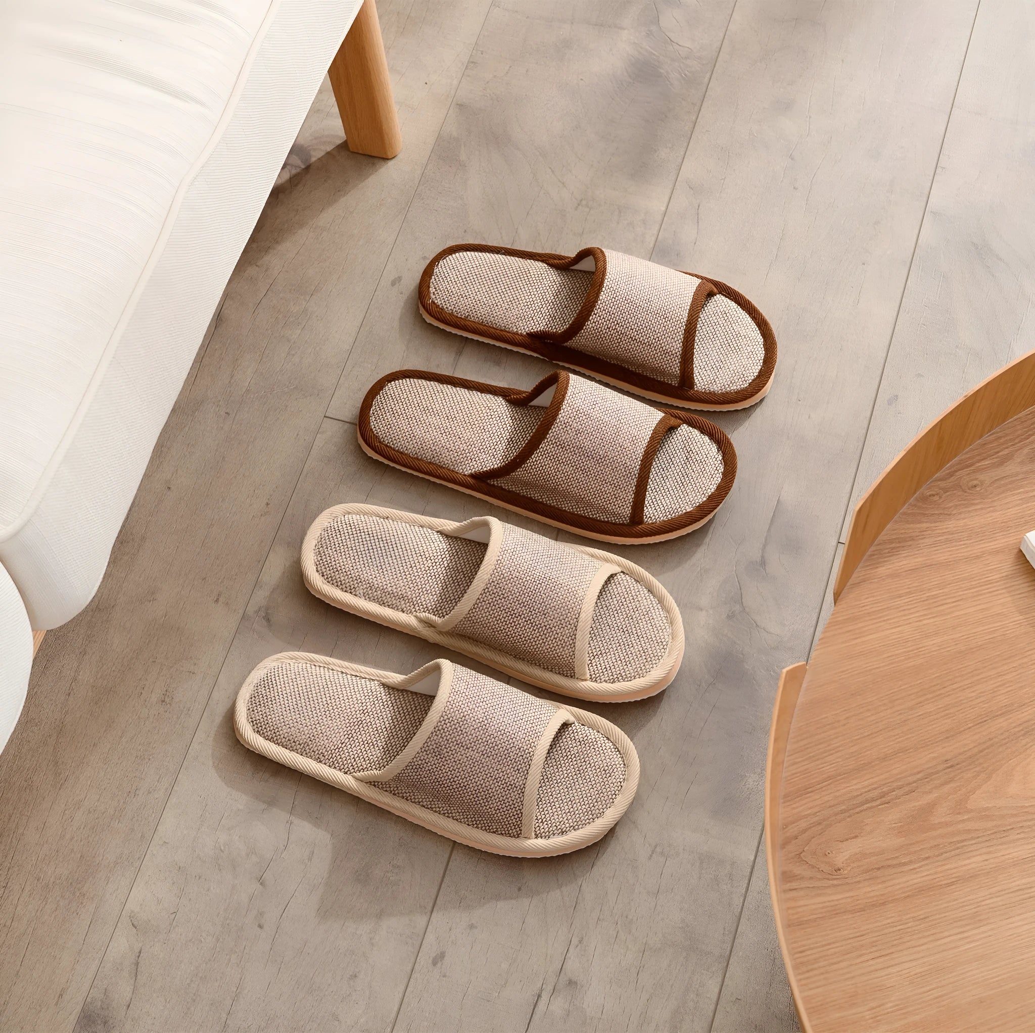 Women's open-toe linen slipper in a light brown colour, showing the breathable design and thickening sole.