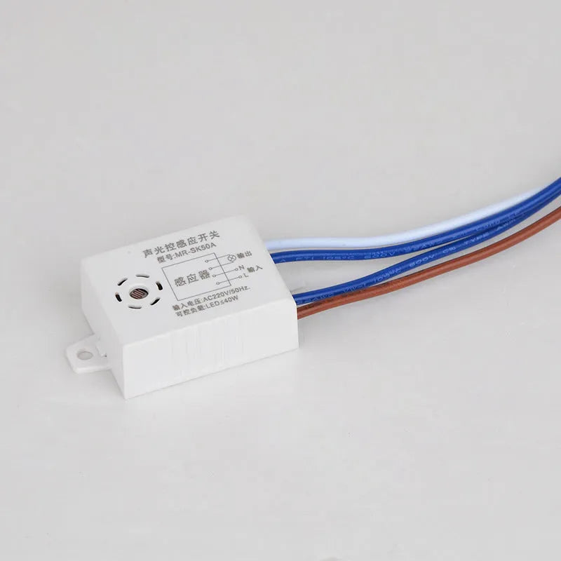 White sound and light control switch with dual sensor module for voice activated indoor lighting automation