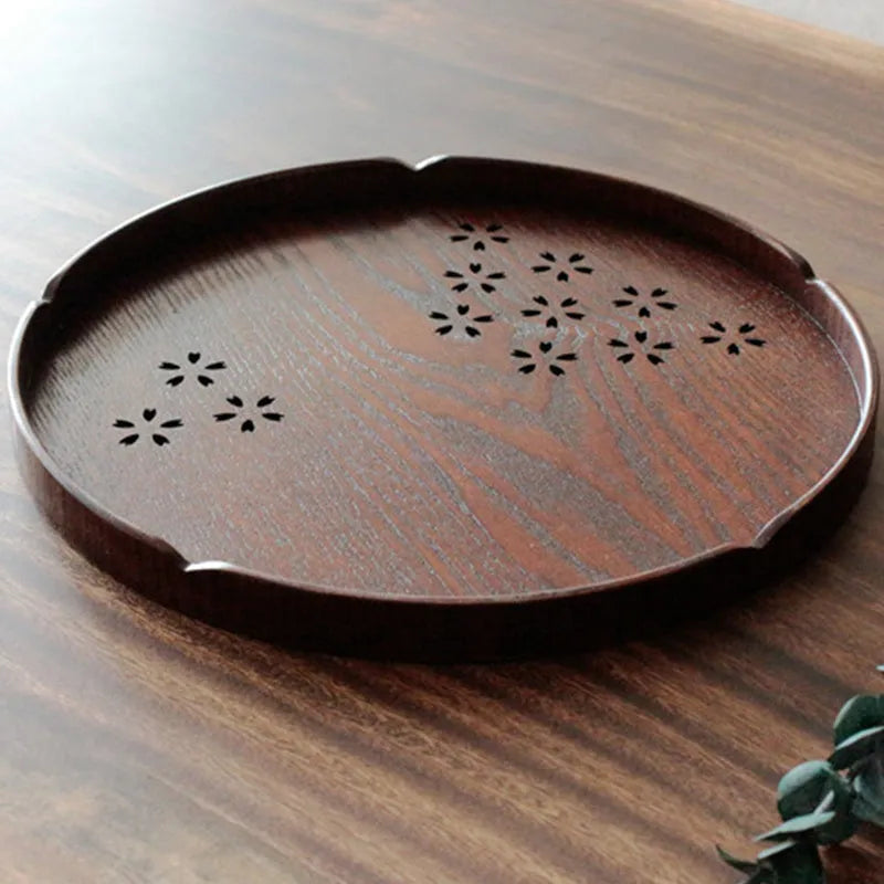 Wooden shallow dessert plate with hollow cherry blossom pattern measuring 30cm diameter
