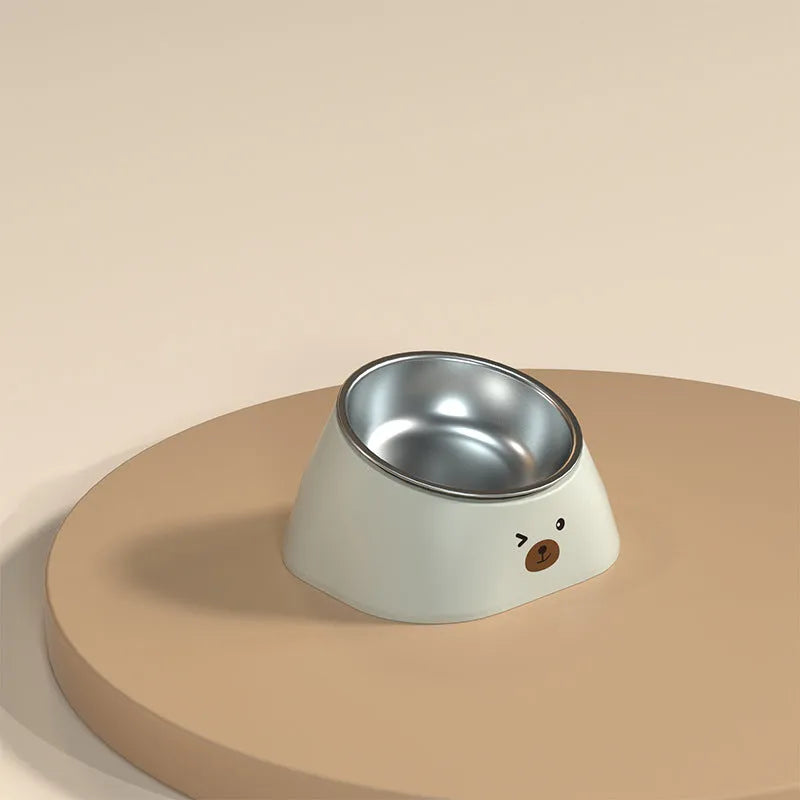 Green tilted stainless steel pet bowl showing 15-degree feeding angle