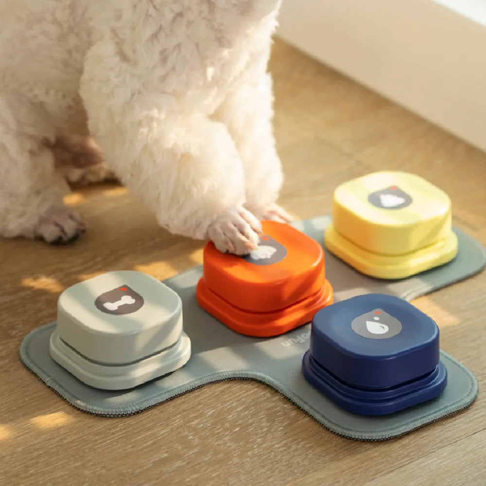 Pet communication button in orange, blue, grey, and yellow with optional 4-grid mat