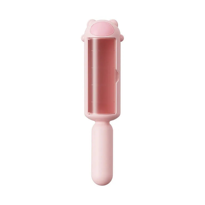 Blue reusable pet hair remover roller with self-cleaning base for furniture and car seats.