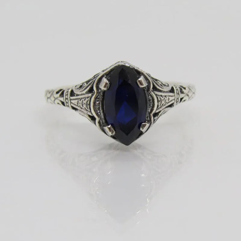 Silver geometric hollow women's ring shown in alloy with electroplated finish