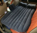 Ultra-thickened flocking cloth inflatable bed set up on a car rear seat with two pillows.