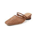 Women's black retro slippers with a square toe, chunky heel, and breathable hollow-out design on a rubber sole.