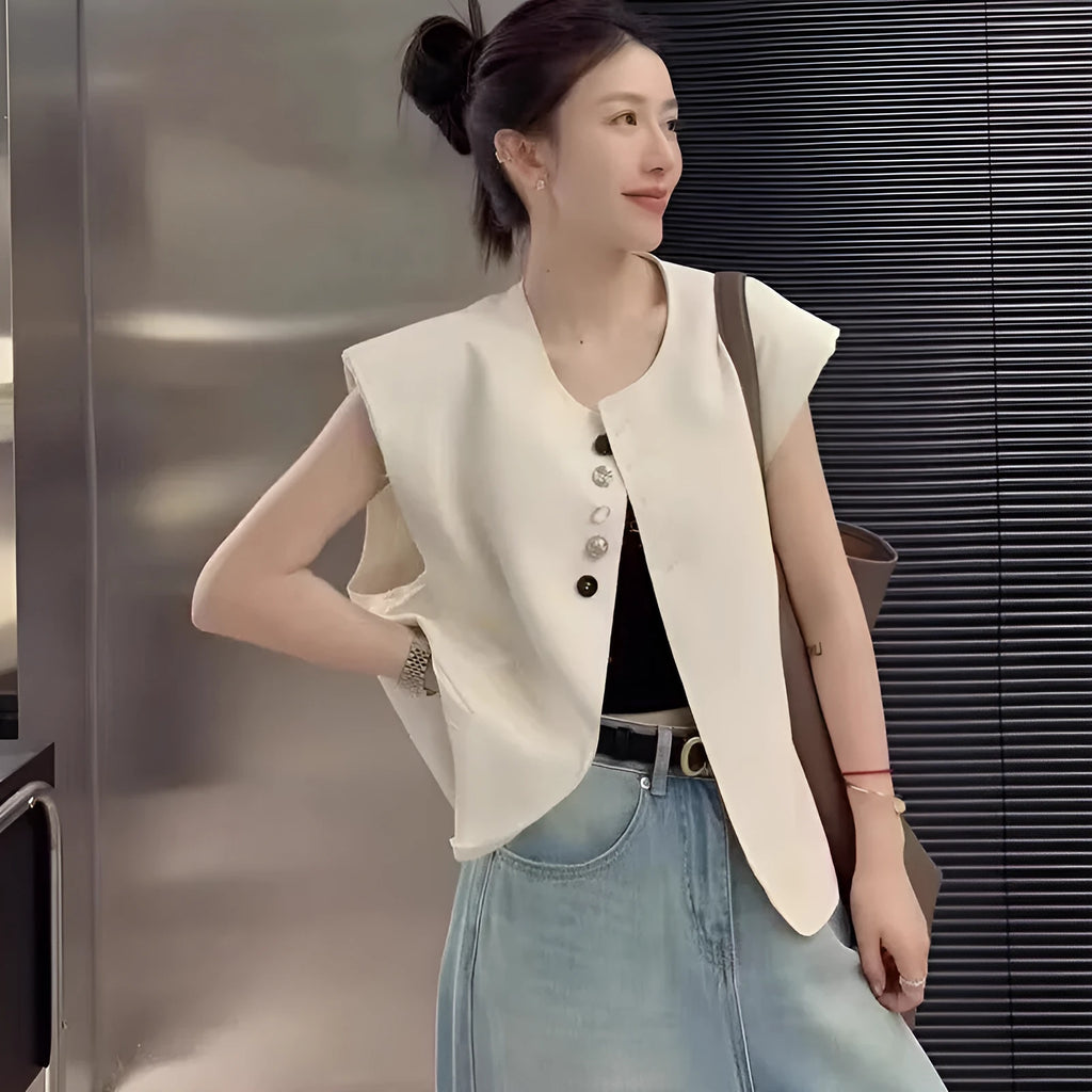 Women's loose fit polyester vest with pocket details in milky white colour