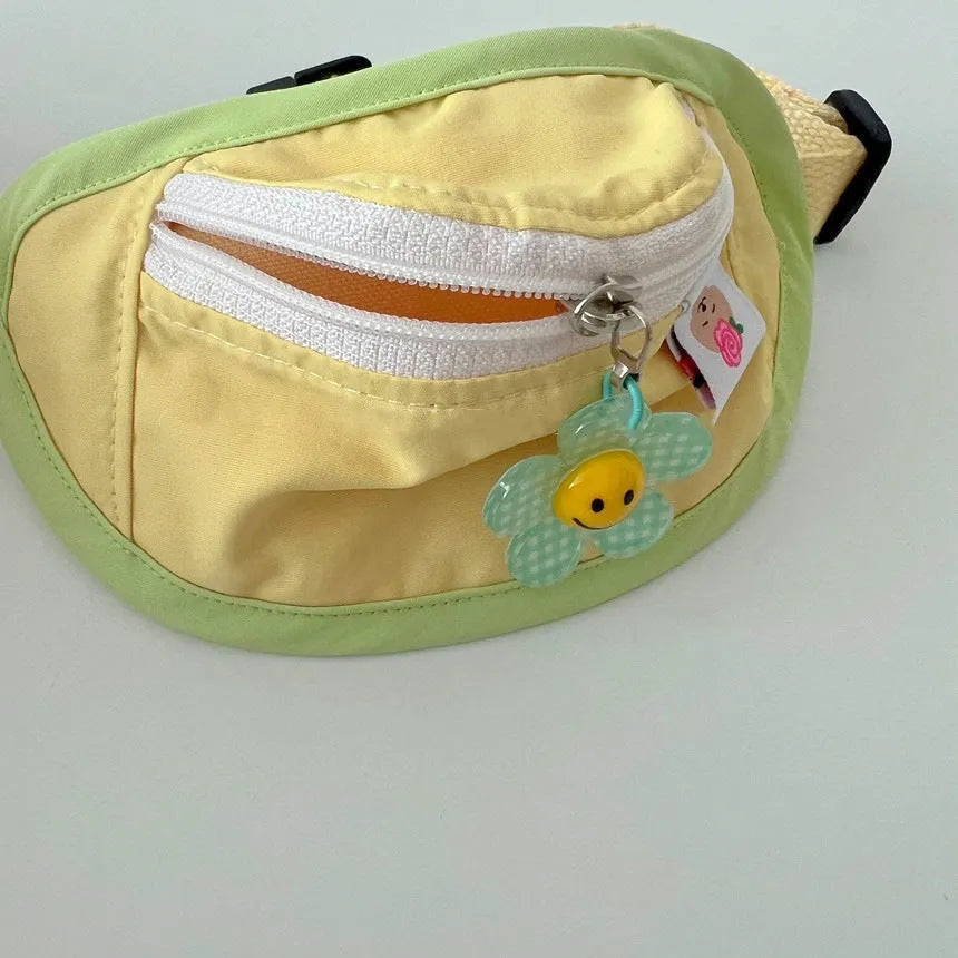 Powder blue soft fabric backpack carrier for a small dog or cat with adjustable chest straps.