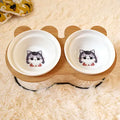 Ceramic cat bowl holder with raised rack in grey cat colour