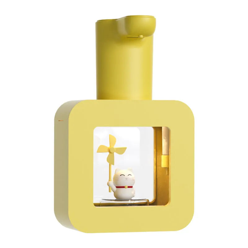 Pink automatic soap dispenser shaped like a unicorn or kitten cartoon character for kids.