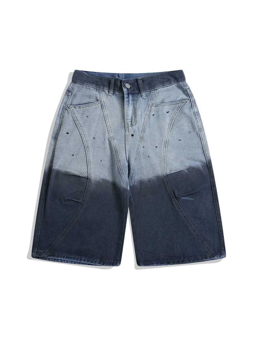 Blue loose-fit cropped jeans with a tie-dye gradient pattern and a mid-waist