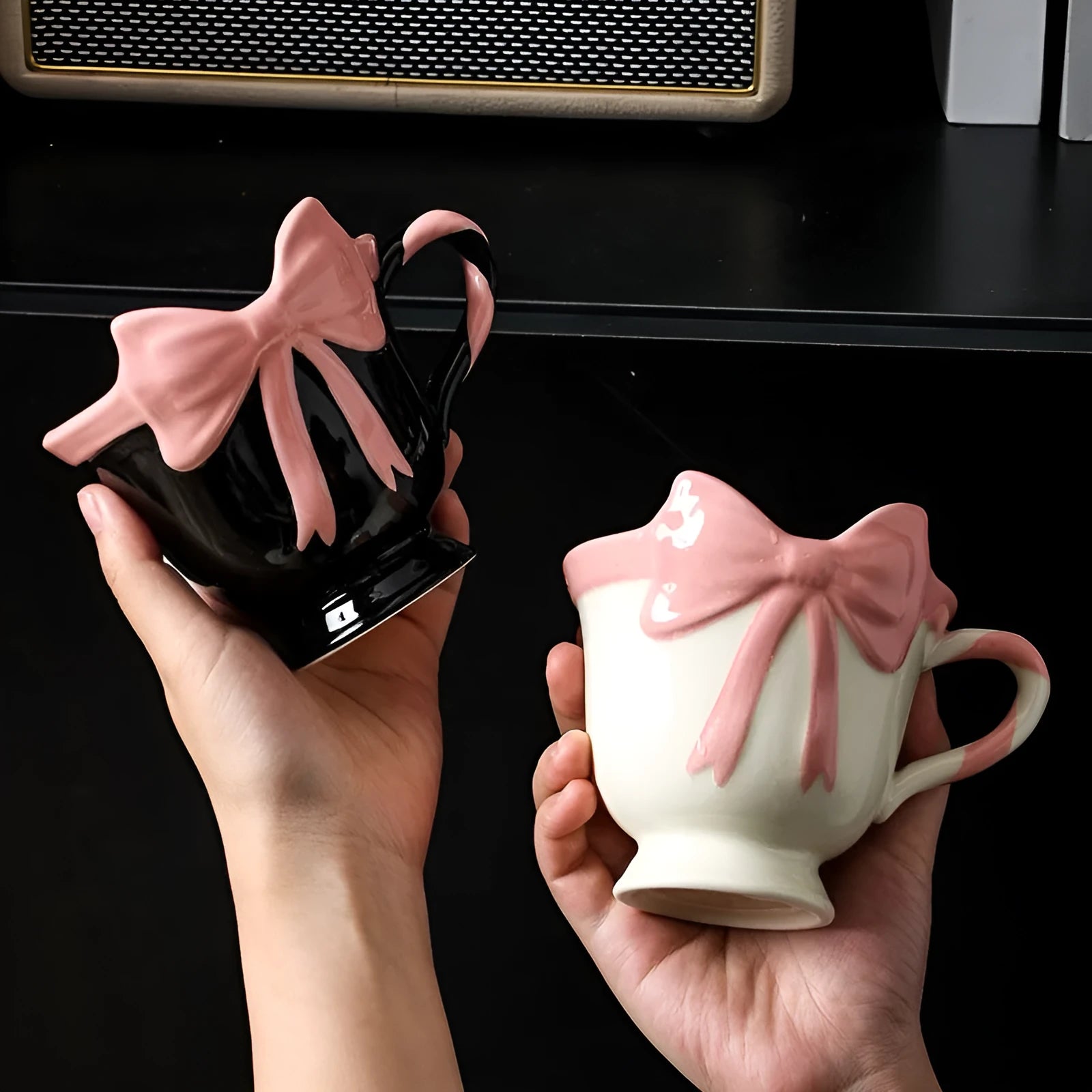 Heart-shaped ceramic mug with decorative bow design in white powder or black pink colour