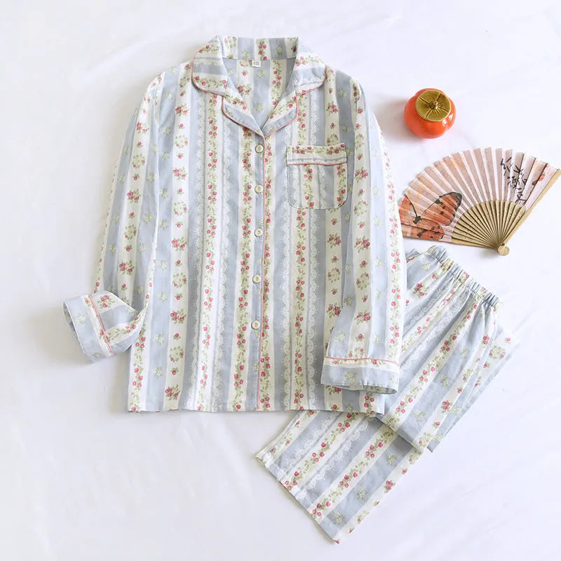 Women's cotton gauze long-sleeved pyjama set with trousers in a striped or small fruit print pattern.