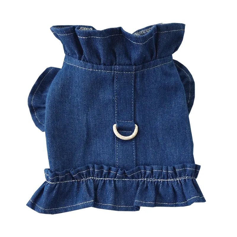 Blue denim dog dress with ruffles and leash attachment points on chest and back