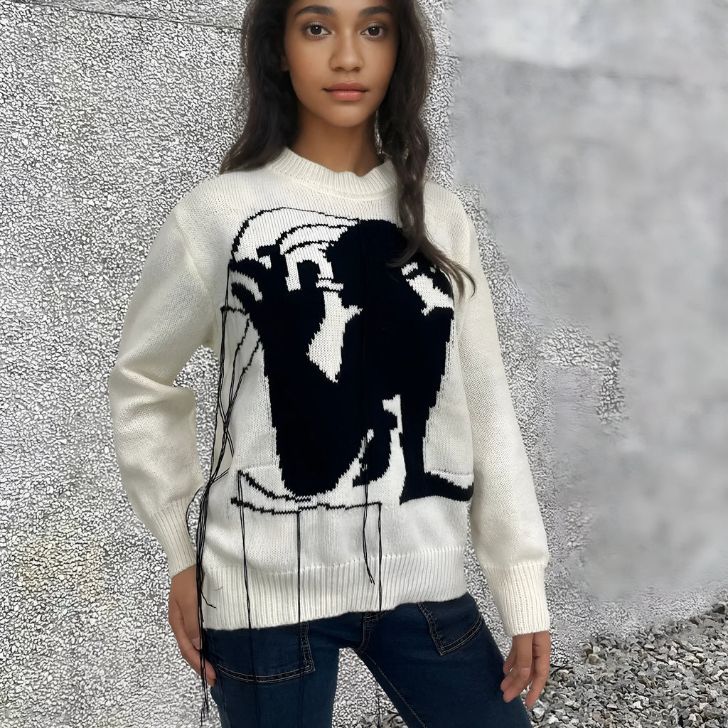 Women's grey alpaca wool sweater with tassel detailing and loose fit