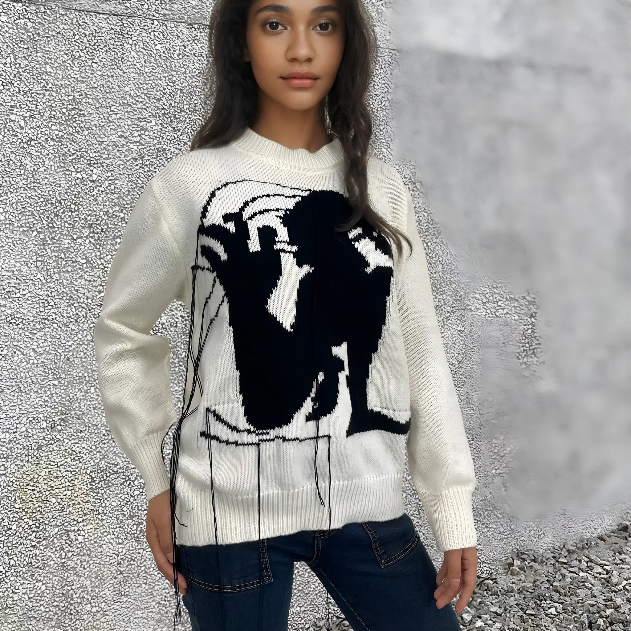Women's grey alpaca wool sweater with tassel detailing and loose fit