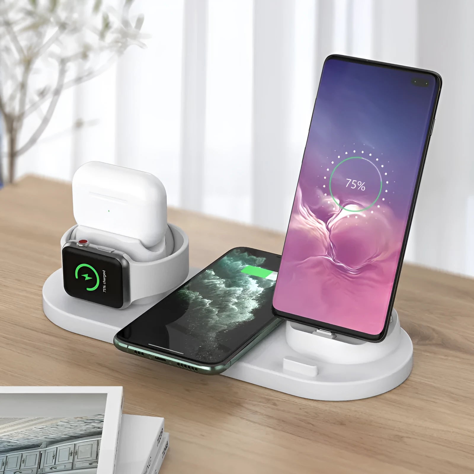 Black 6-in-1 wireless charging station holding phone with AirPods and watch charging