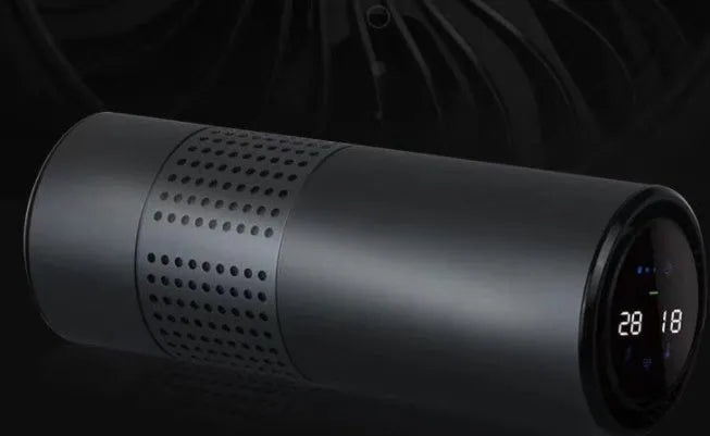 Aluminium alloy car air purifier with USB cable, negative ion generator, and air quality display.