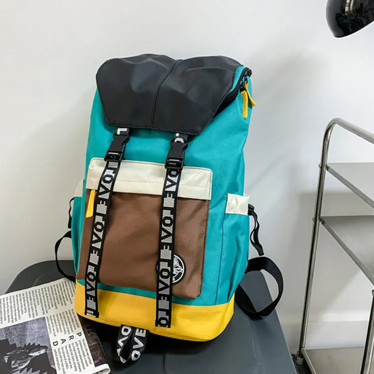 Oxford cloth backpack in black, green, or red with shoulder straps and 32cm by 46cm dimensions