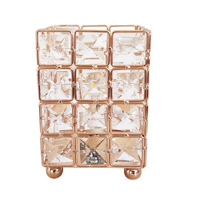 Himalayan crystal salt lamp with dimmer switch on wooden base emitting warm amber glow