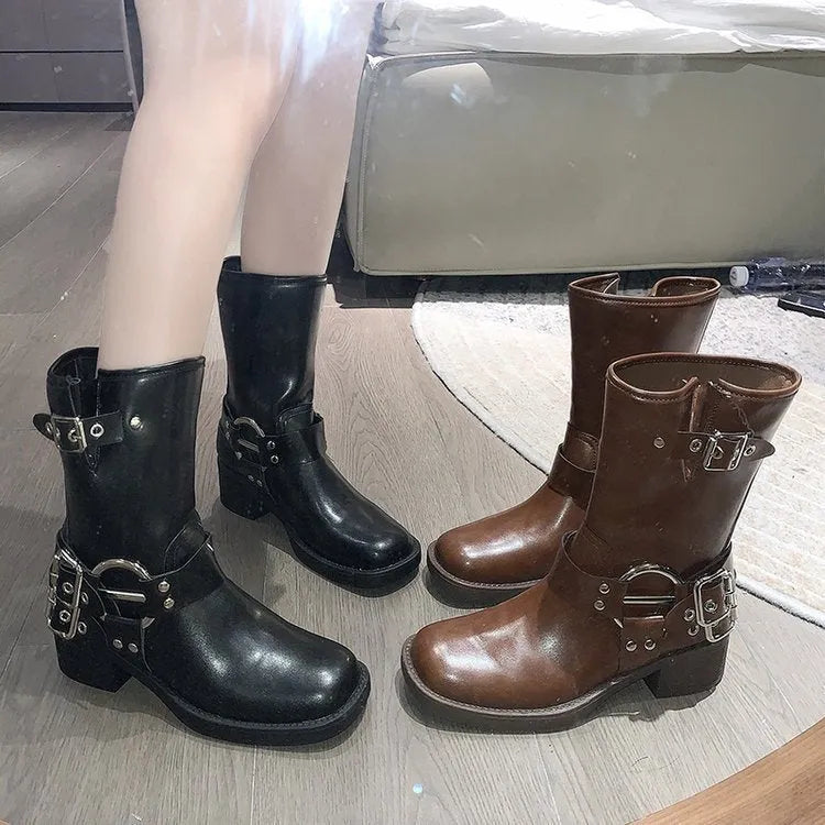 Women's platform boots with mid-calf length and belt buckle detail in black or brown colours