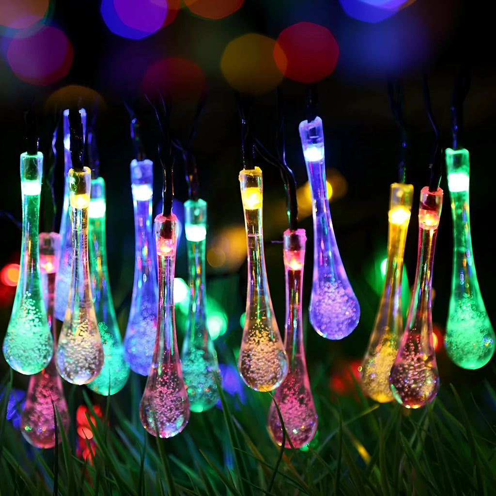 30 LED solar-powered water drop shaped string lights on a 6.5m cable for outdoor garden use.