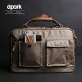 Dpark black laptop bag with single shoulder sling carrying a 15-inch laptop