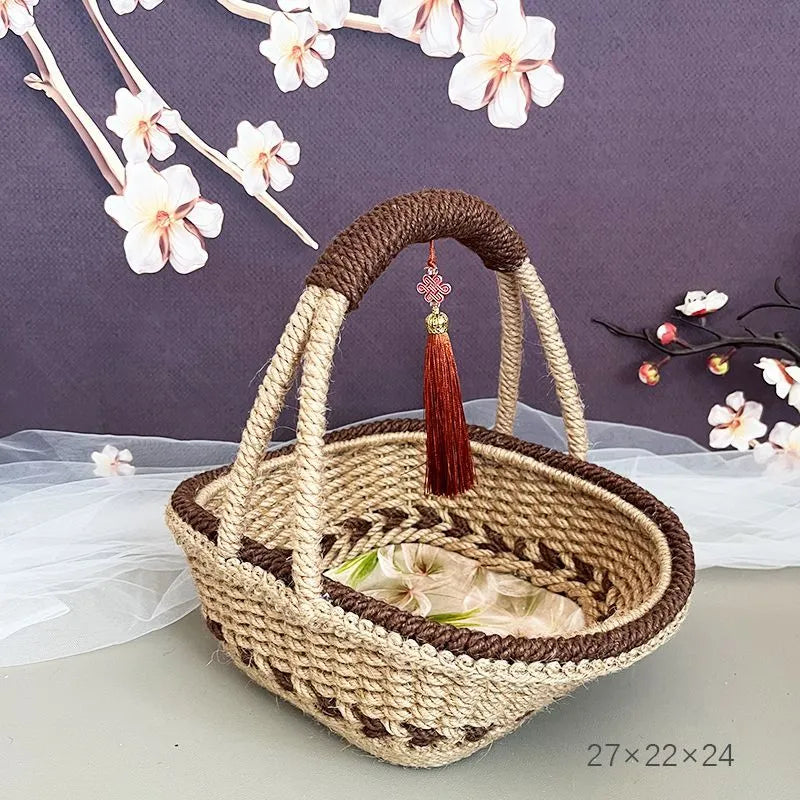 Hand-woven rustic straw storage basket in coffee brown colour.