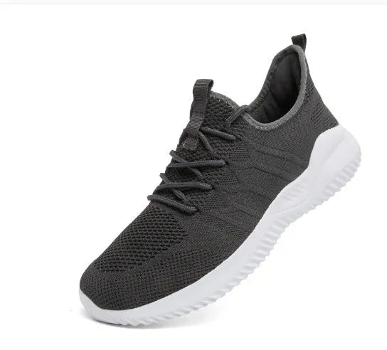 Men's black and white breathable mesh sneakers with lace-up closure and PVC sole.