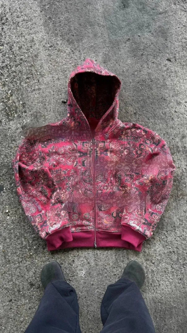 A blue loose-fitting men's hooded zip coat with long sleeves, shown on a hanger.
